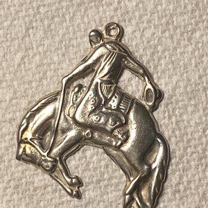Sterling silver bucking bronco pendant